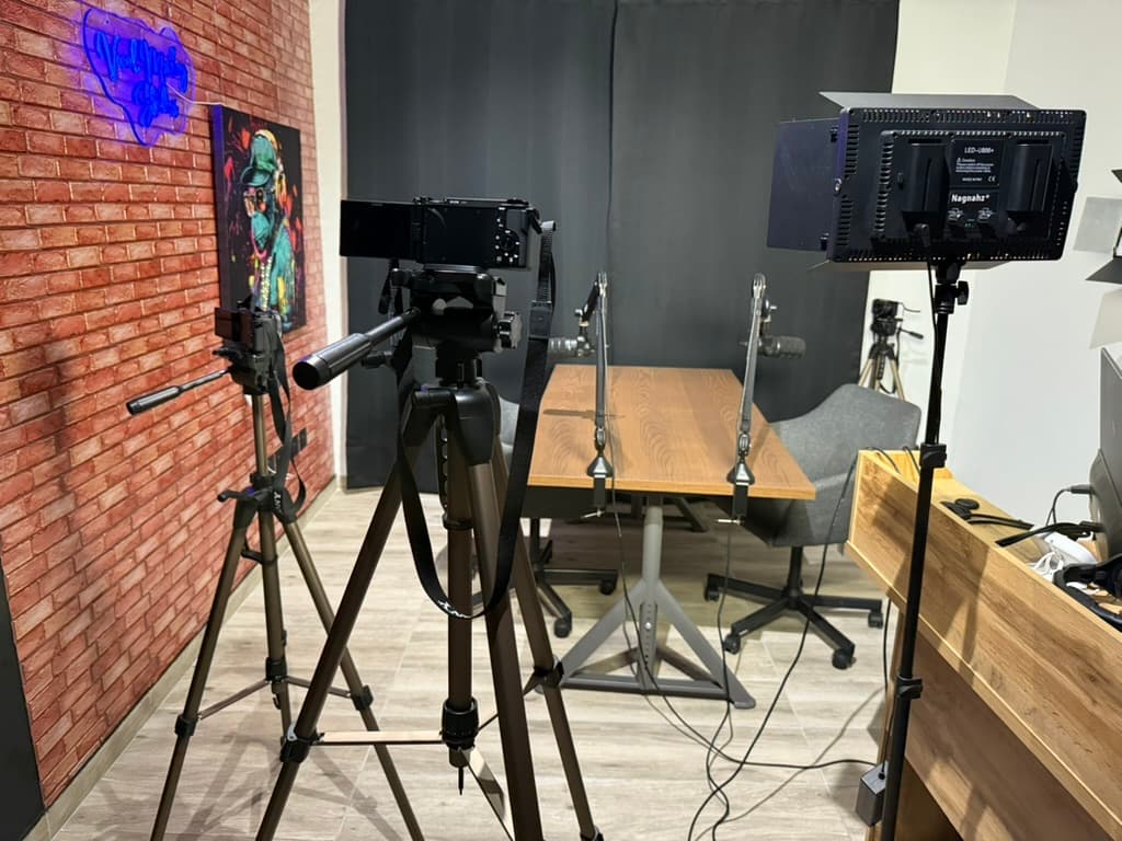 Soundproofed podcast room with guest microphones at Vocal Monkey Studios